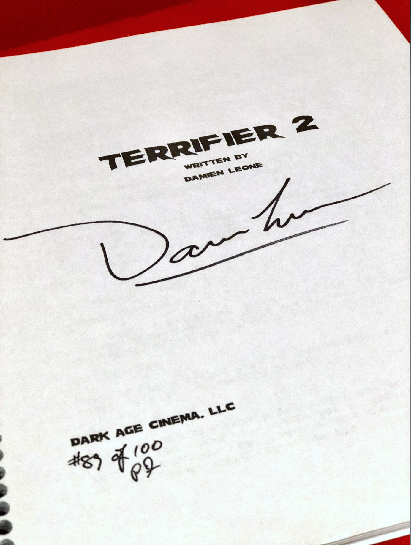 Signed Terrifier 2 Script interior screenplay pages and authentic brass fastener binding